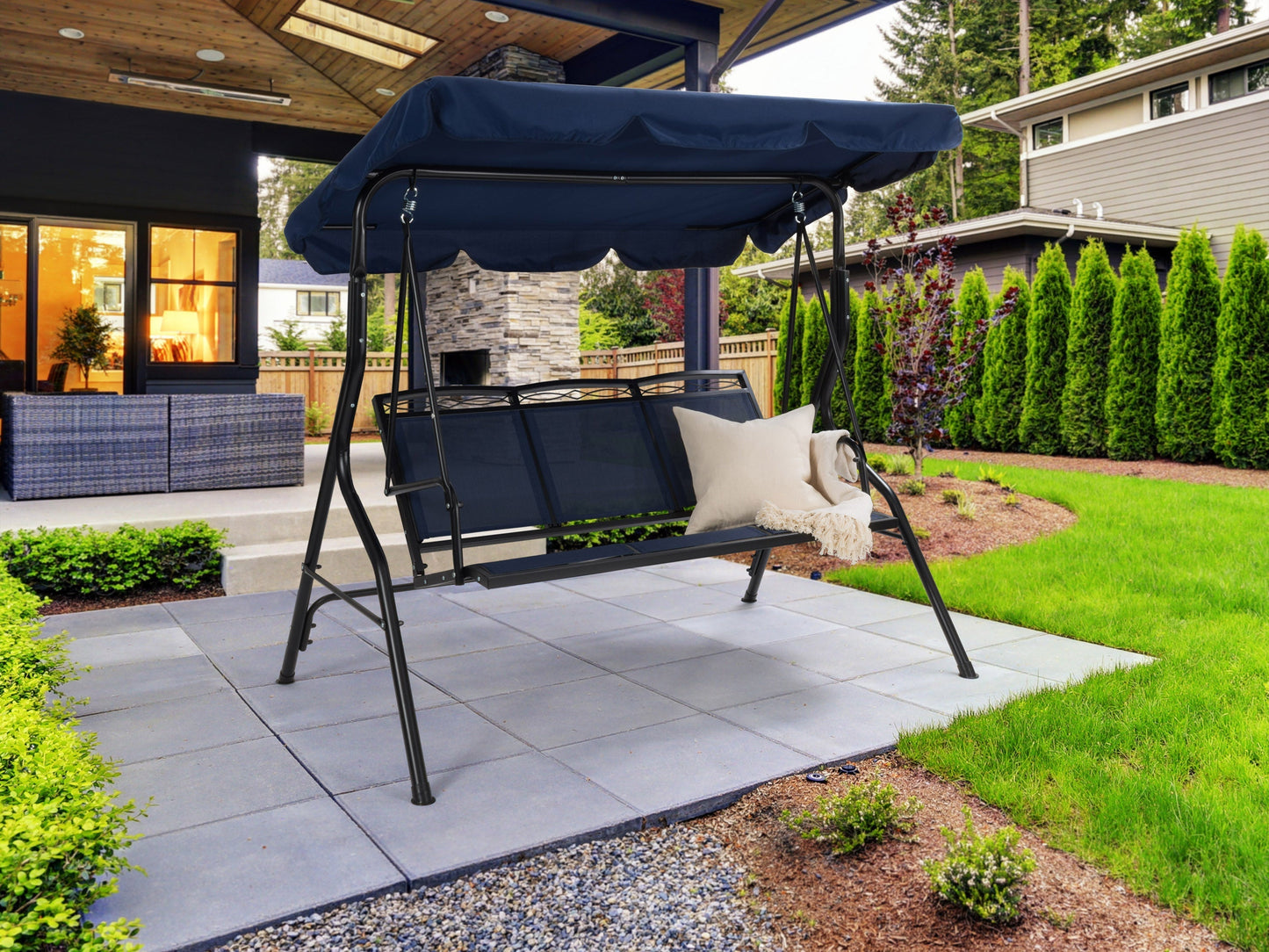 Navy blue patio swing with canopy, cushioned seats, and sturdy metal frame for outdoor relaxation.