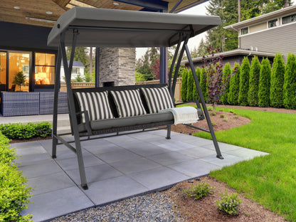 Grey patio swing with adjustable canopy, cushioned seats, and sturdy metal frame for outdoor relaxation.