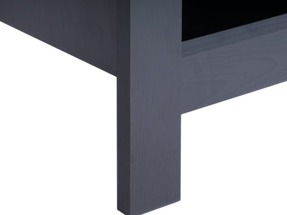 Black media console for TVs up to 85", featuring sleek design, ample storage, and durable wooden construction.