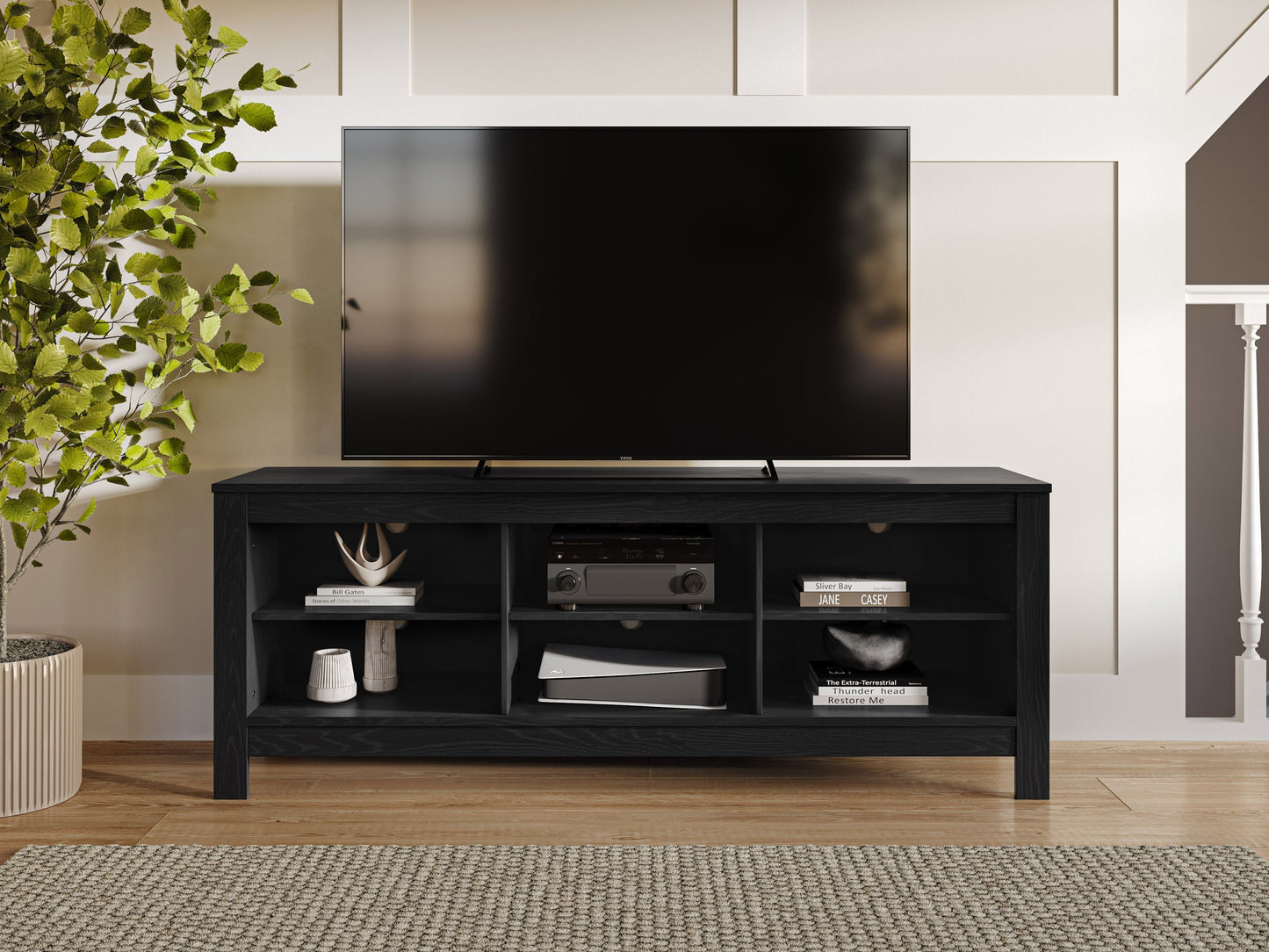 Black media console for TVs up to 85 inches, featuring sleek design, ample storage, and sturdy construction.