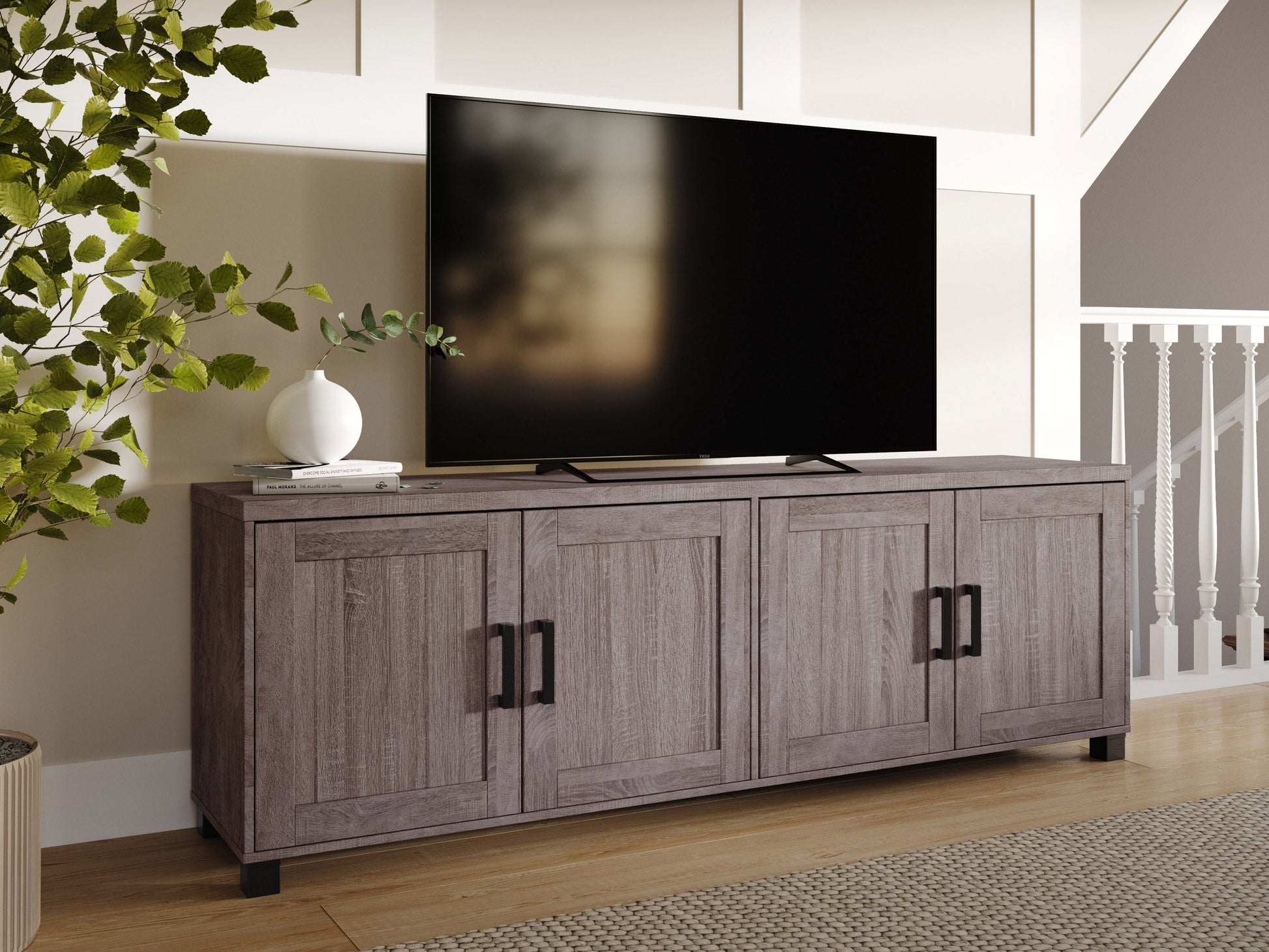 Brown TV stand for TVs up to 85", featuring cabinet doors, sleek design, and sturdy wooden construction.