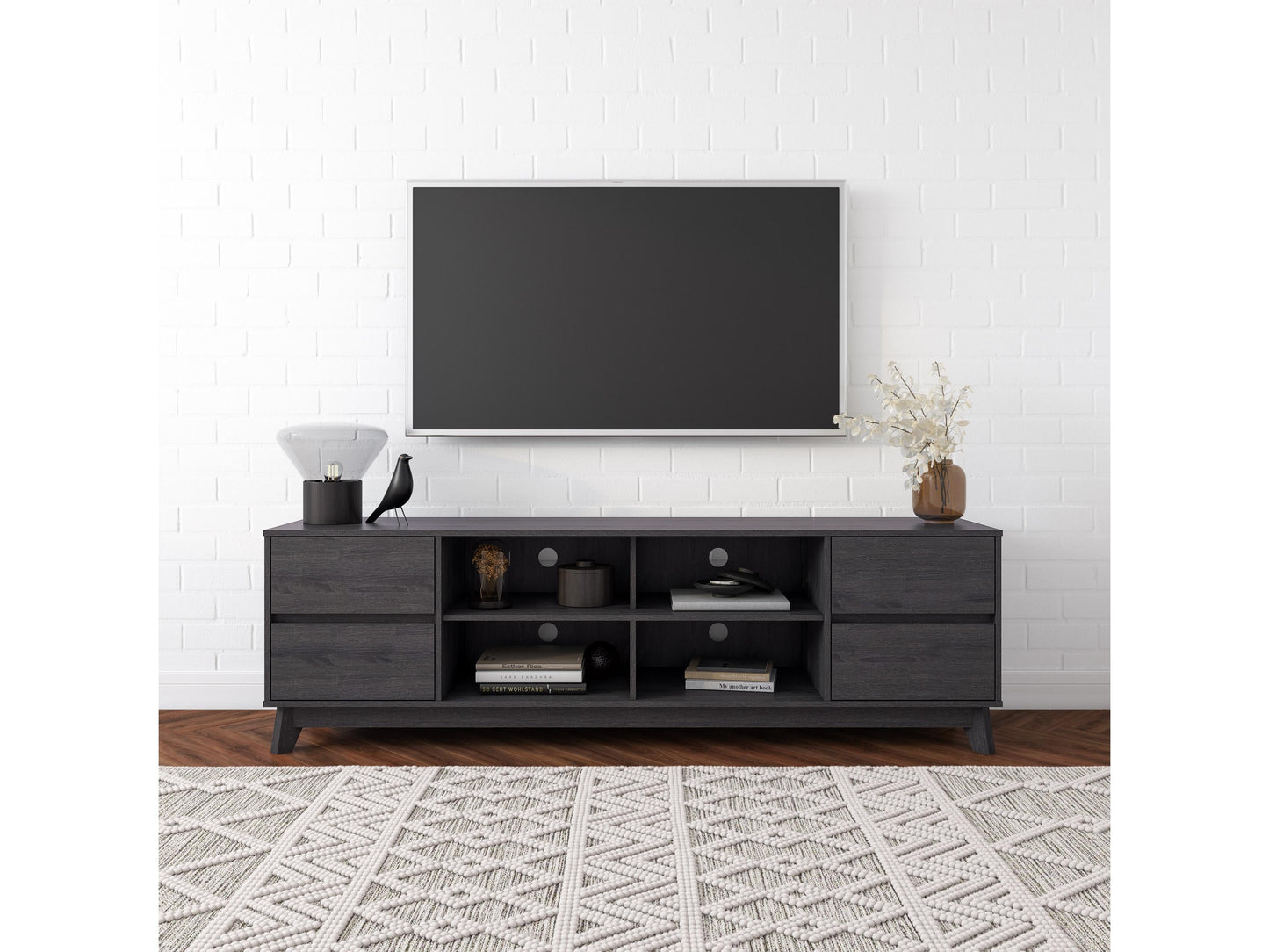 Modern grey TV stand for up to 85-inch TVs, featuring sleek design, ample storage, and durable wood construction.