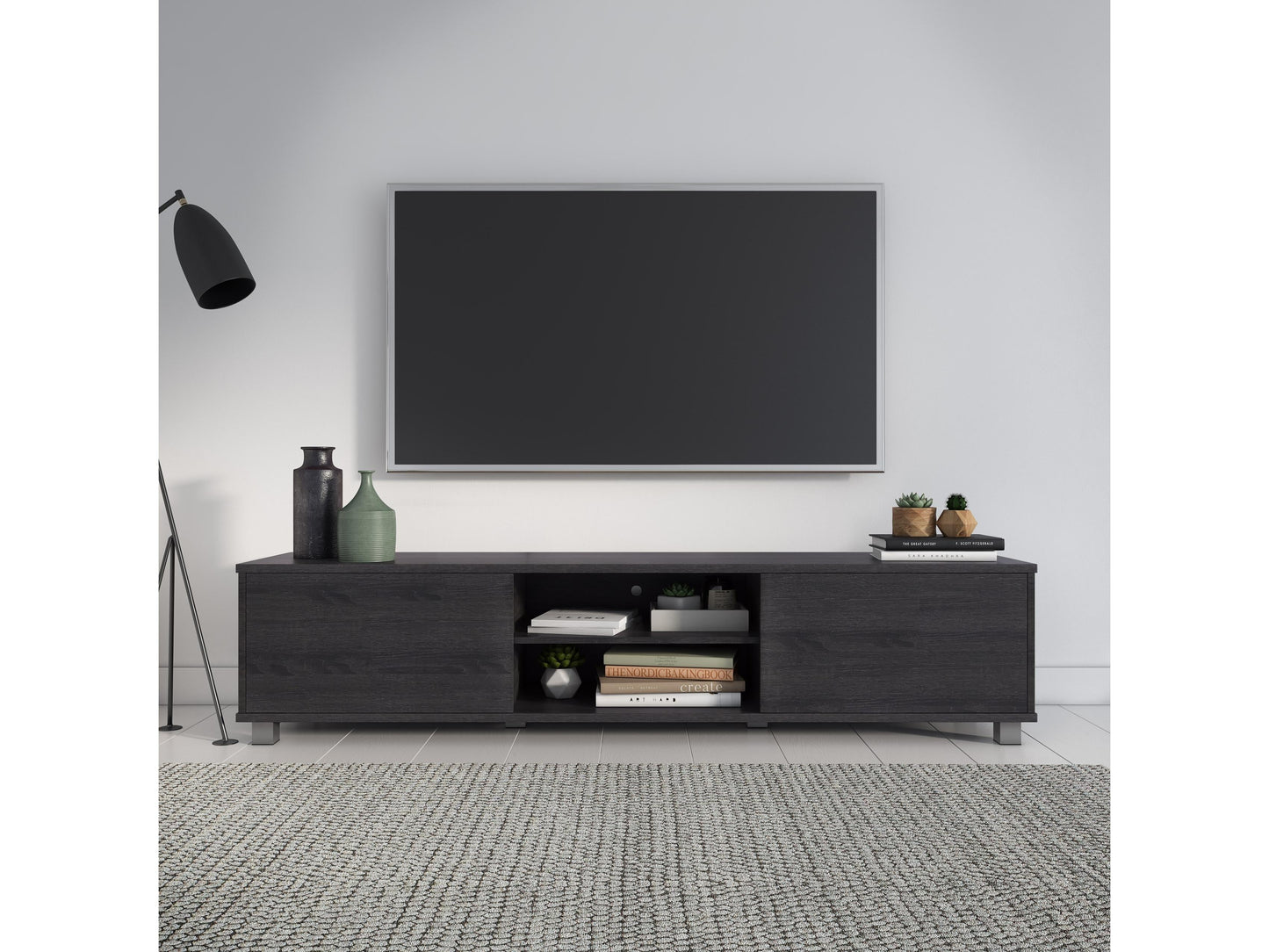 Dark grey modern TV stand for TVs up to 85 inches, sleek design with open shelves and wooden legs.