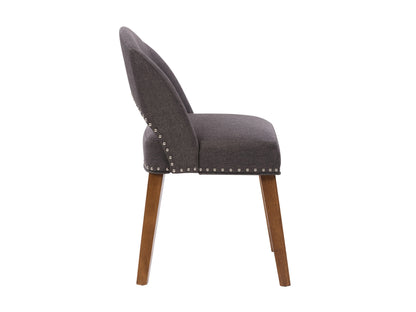 Dark grey mid-century dining chairs, set of 2, with wooden legs and tufted fabric upholstery.