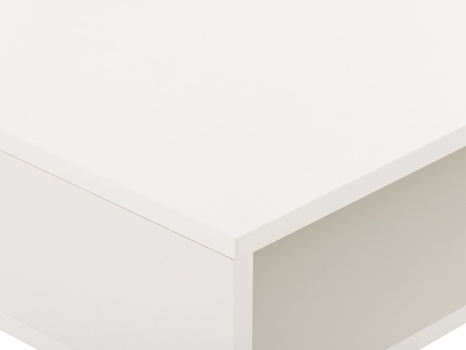 White modern computer desk with sleek metal legs, spacious surface, and minimalist design for home office or study.