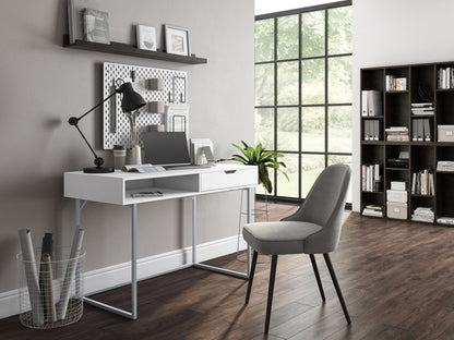 White modern computer desk with sleek metal legs and minimalist design.