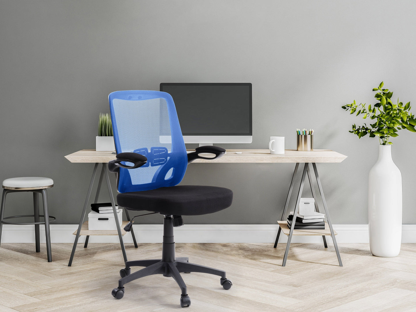 Blue mesh office chair with ergonomic design, adjustable armrests, and lumbar support, ideal for home or office use.