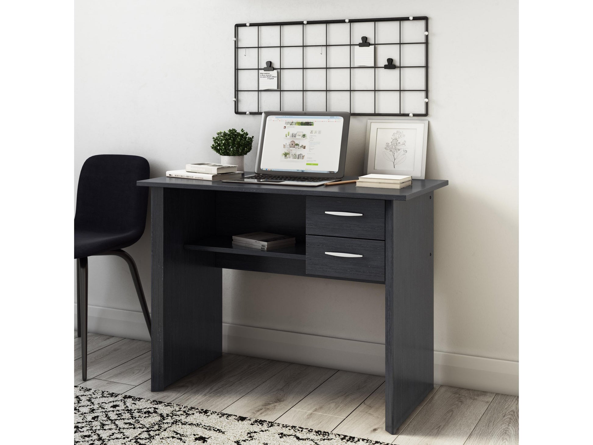 Black wooden desk with drawers, sleek modern design, metal legs, and ample storage space for home office or study.