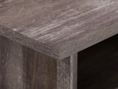 Brown wooden desk with drawers, sleek design, and metal handles.