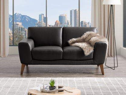 Brown faux leather loveseat with tufted backrest, sleek wooden legs, and modern design; ideal for contemporary living rooms or offices.