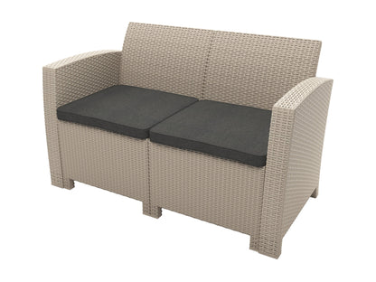 Grey outdoor patio conversation set with four pieces including a loveseat, two armchairs, and a coffee table, featuring weather-resistant wicker and plush white cushions, perfect for garden or backyard lounging.