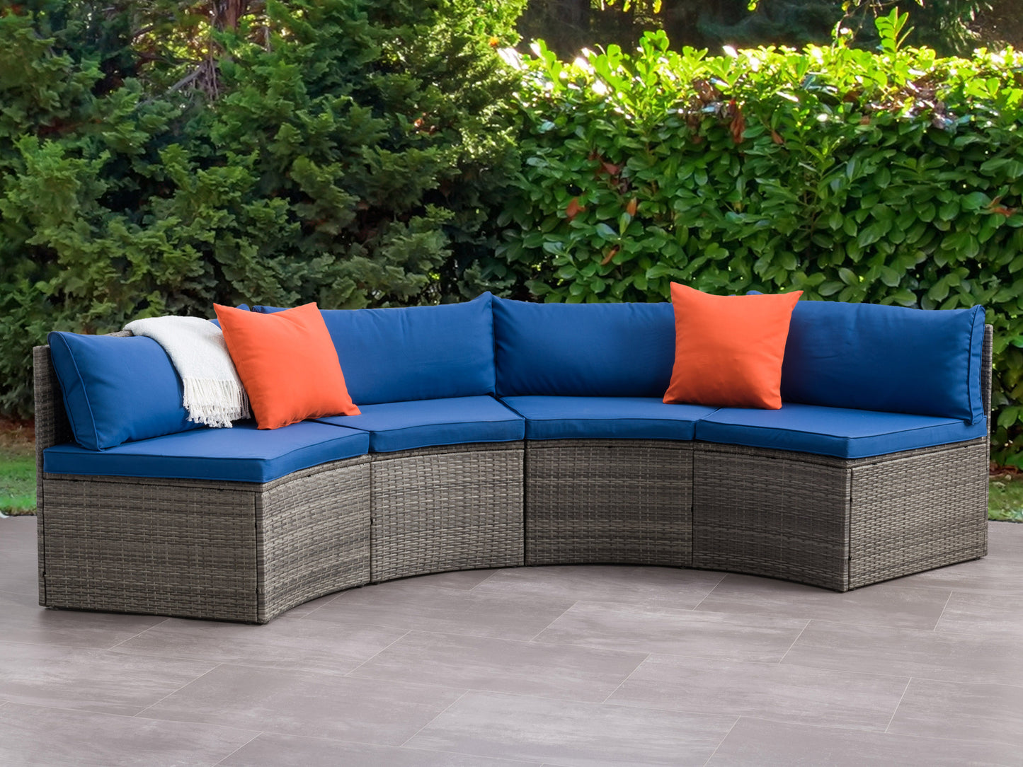 Curved outdoor sofa, 2-piece patio sectional with beige cushions, brown wicker frame, and modern design, perfect for garden or patio lounging.