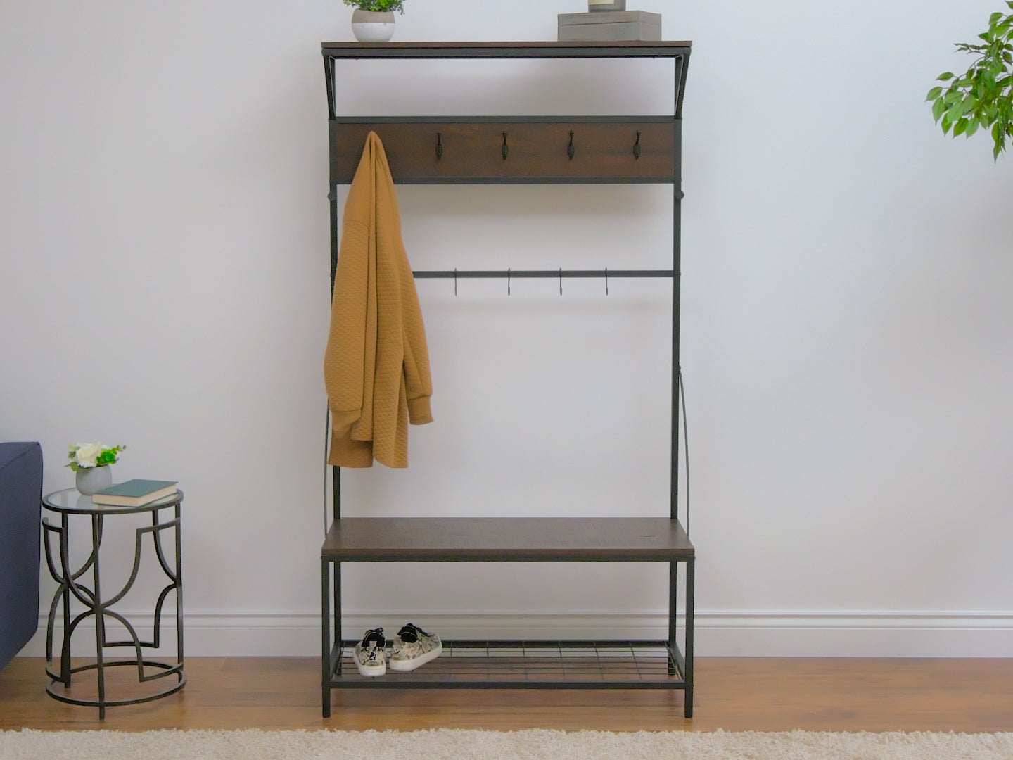 Modern Hall Tree with Storage Bench in white and walnut finish, featuring coat hooks, upper shelf, and spacious bench storage. Ideal for organizing entryways with a sleek, dual-tone design and practical functionality.